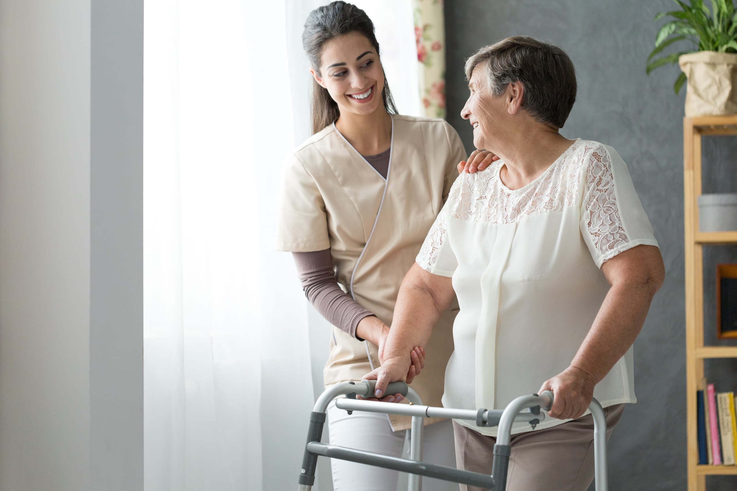 nurse-and-woman-using-walker nurse-and-woman-using-walker